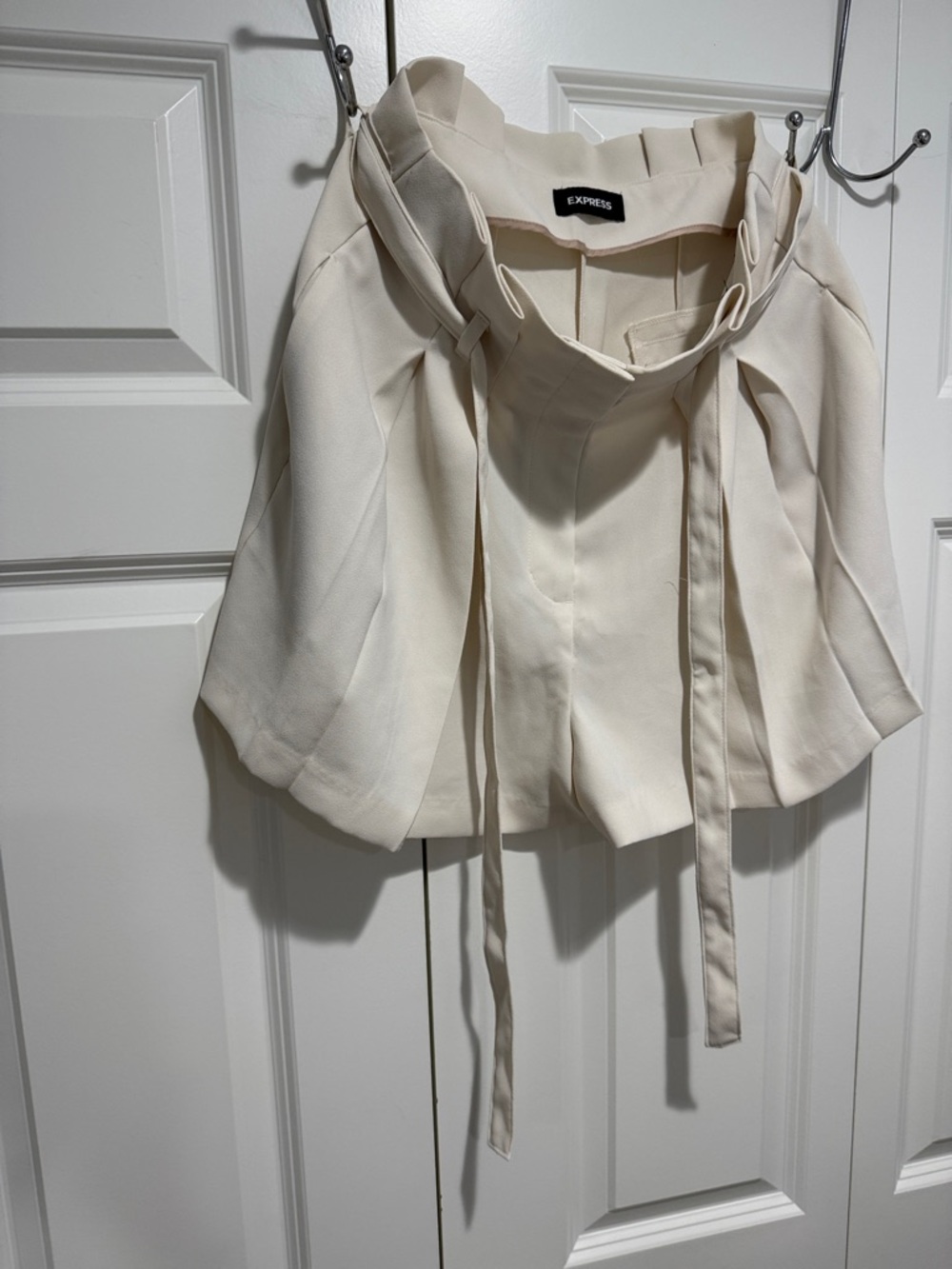 Express Cream high waisted pleated dress shorts